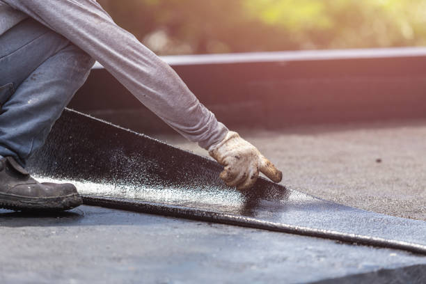 Professional Waterproofing technician working in Grand Haven, MI